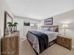 Bedroom featuring carpet