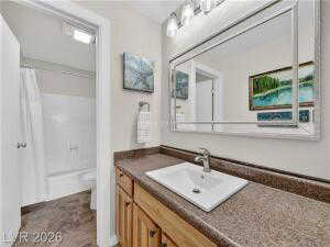 Full bathroom with vanity and shower / tub combo