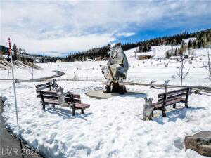 View of yard layered in snow