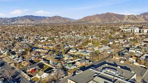 Aerial view of residential area featuring mountains