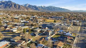 Aerial view of residential area with a mountainous background