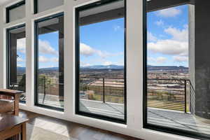 Doorway featuring a mountain view and wood finished floors