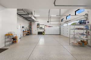 Garage with freestanding refrigerator