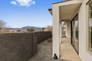 View of patio with a mountain view