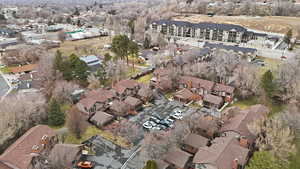 Aerial view of property's location featuring nearby suburban area