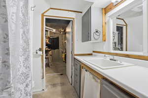 Full bath featuring concrete floors, vanity, and a shower with shower curtain