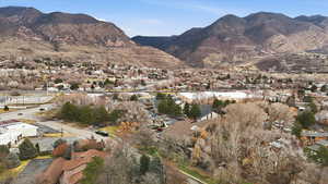 View of mountain background featuring nearby suburban area