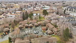 Aerial overview of property's location featuring nearby suburban area