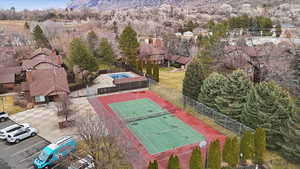 Aerial view of residential area featuring a mountain backdrop
