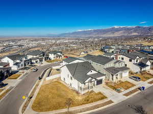 Aerial view of residential area with a mountainous background