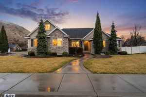 View of front of house featuring stone siding