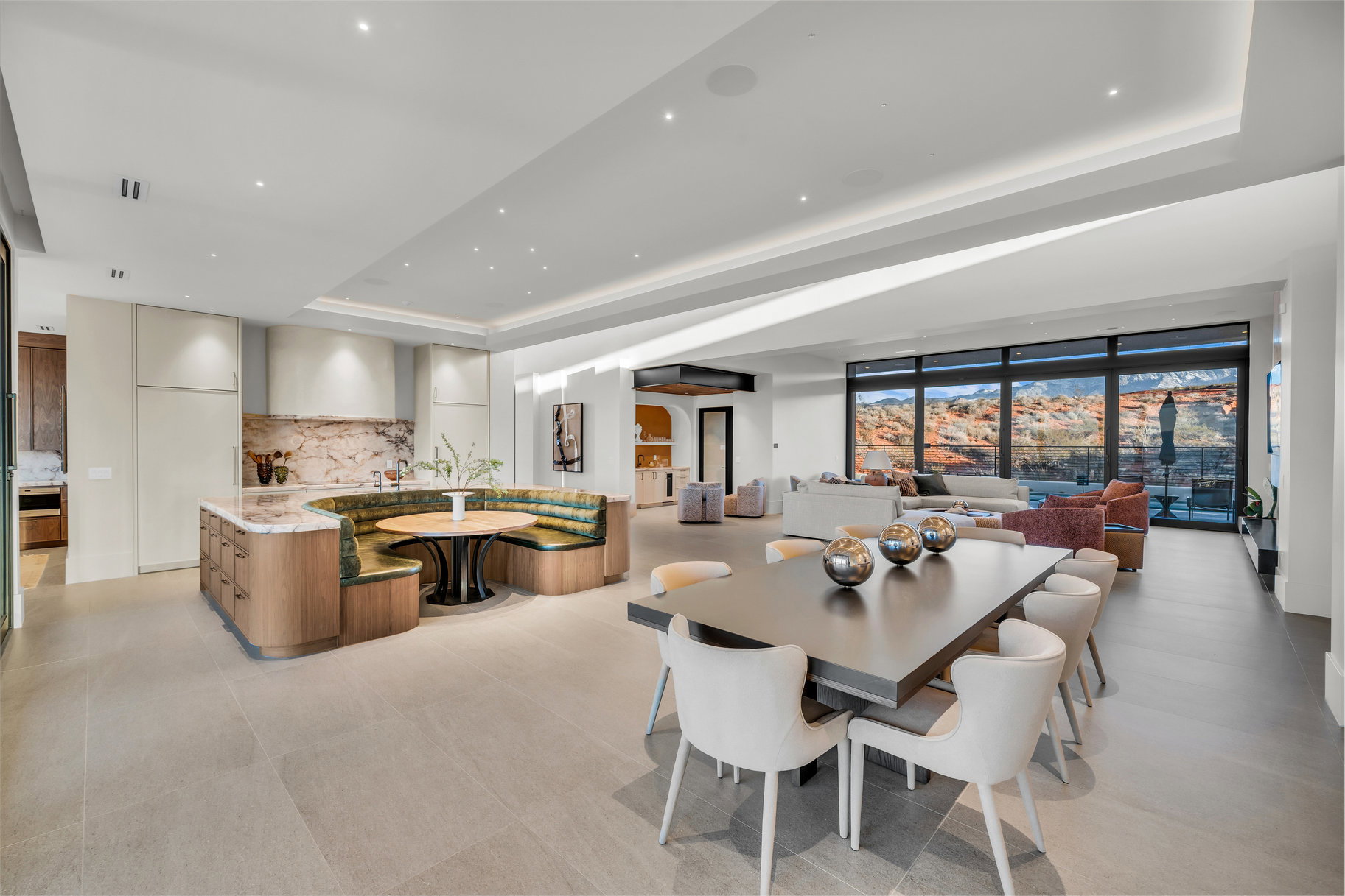 Dining space featuring a tray ceiling and recessed lighting