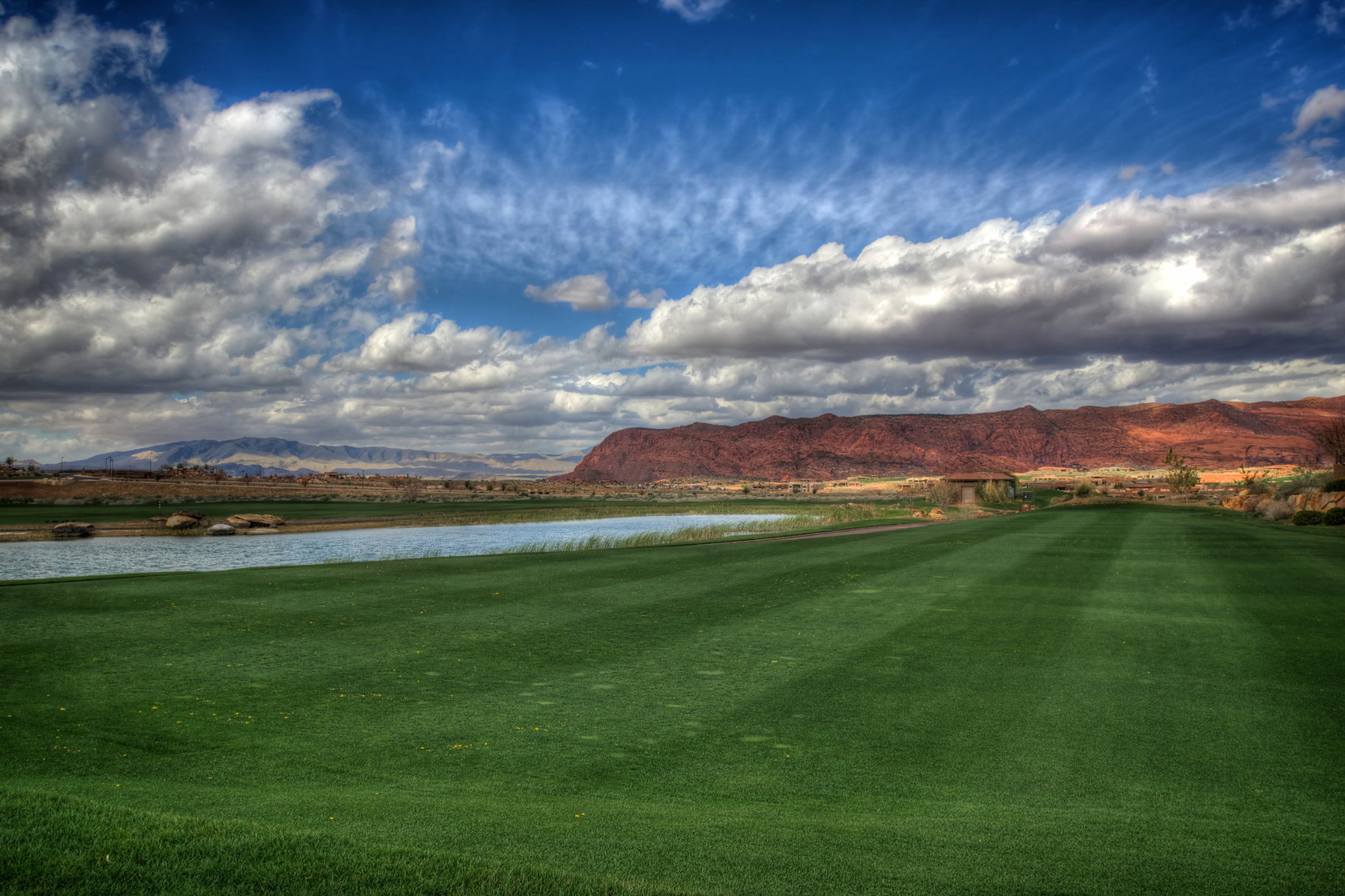 Surrounding community with a water and mountain view