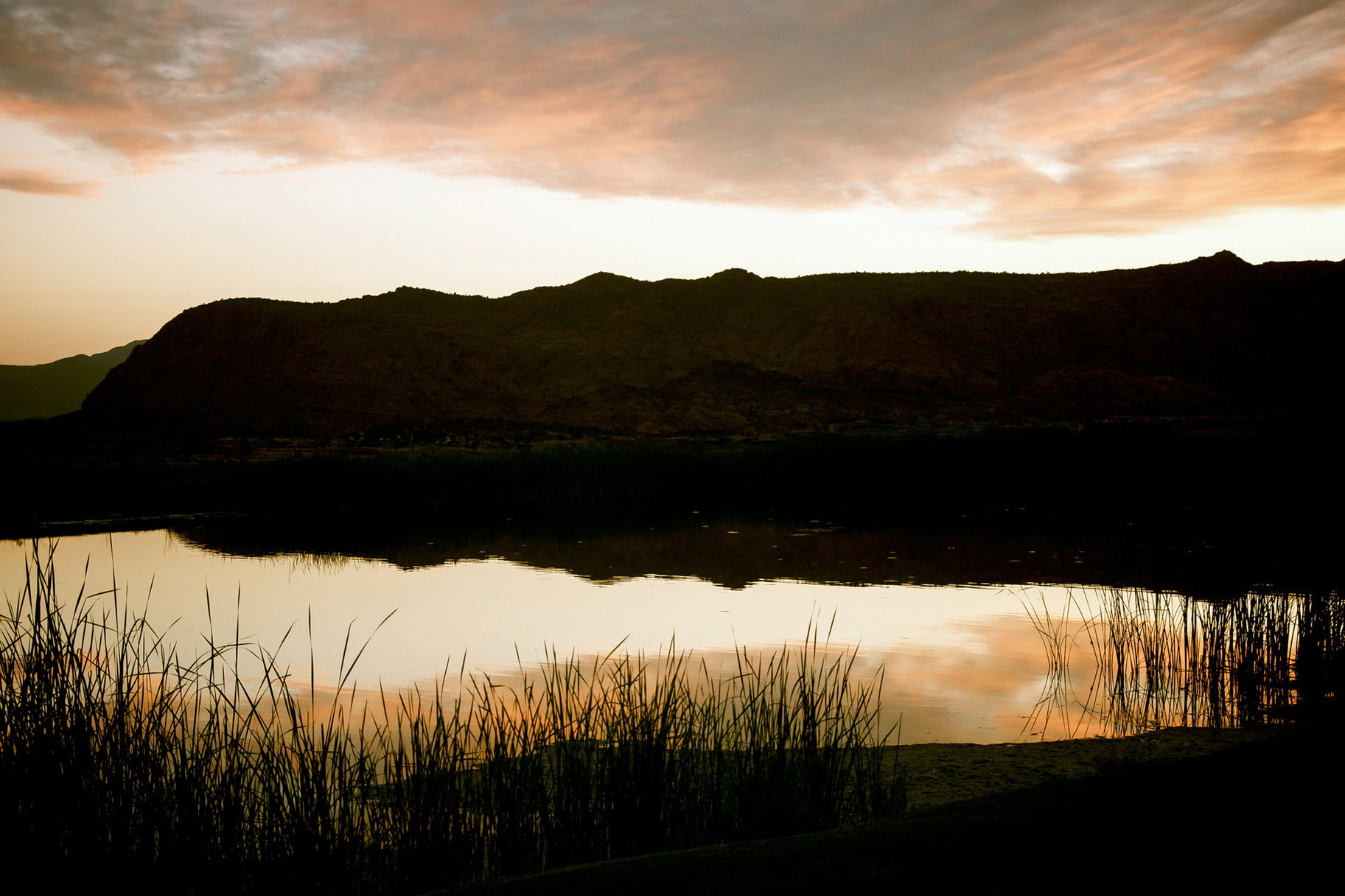 Mountain view featuring a large body of water