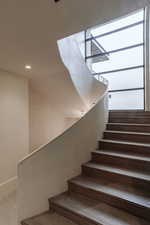 Stairs featuring recessed lighting