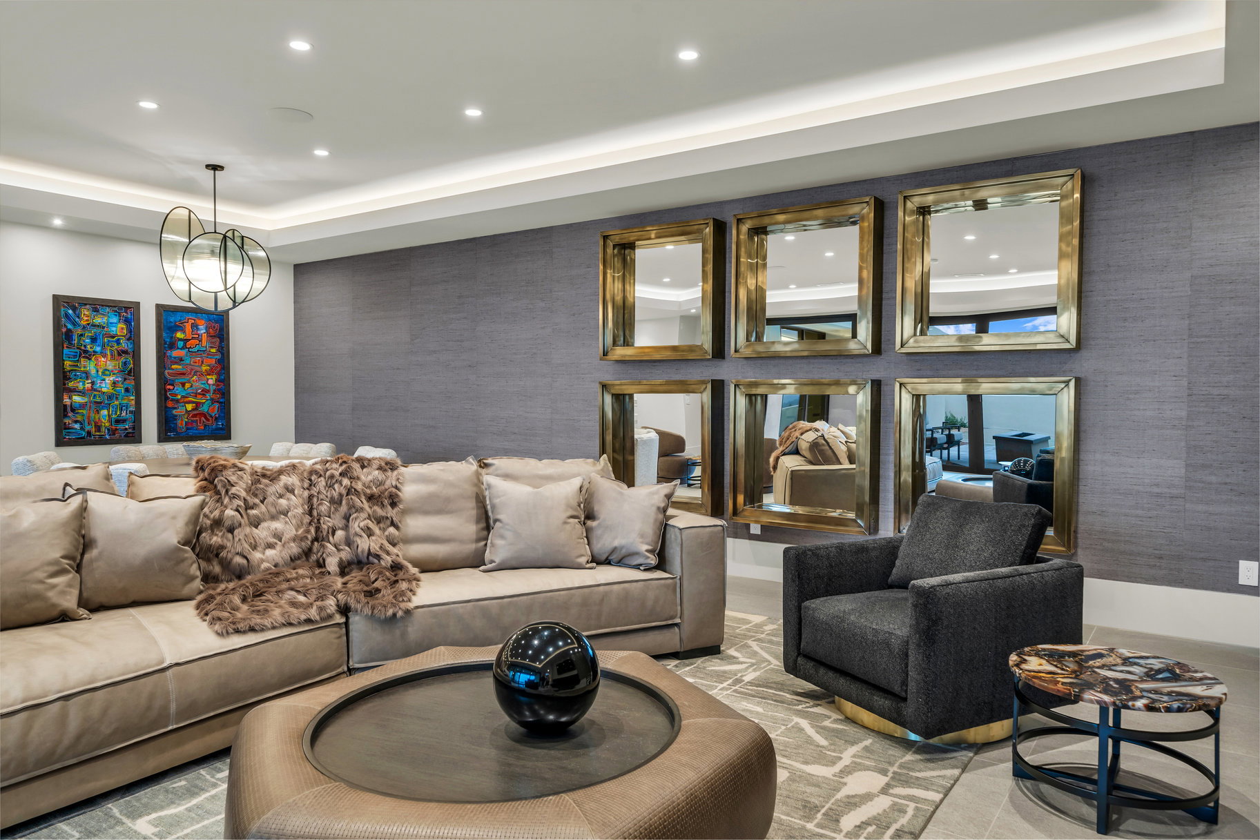 Lobby featuring a tray ceiling and recessed lighting