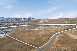 View of property location featuring a mountain backdrop and rural landscape