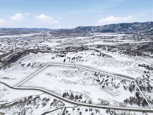 Snowy aerial view with a mountain view
