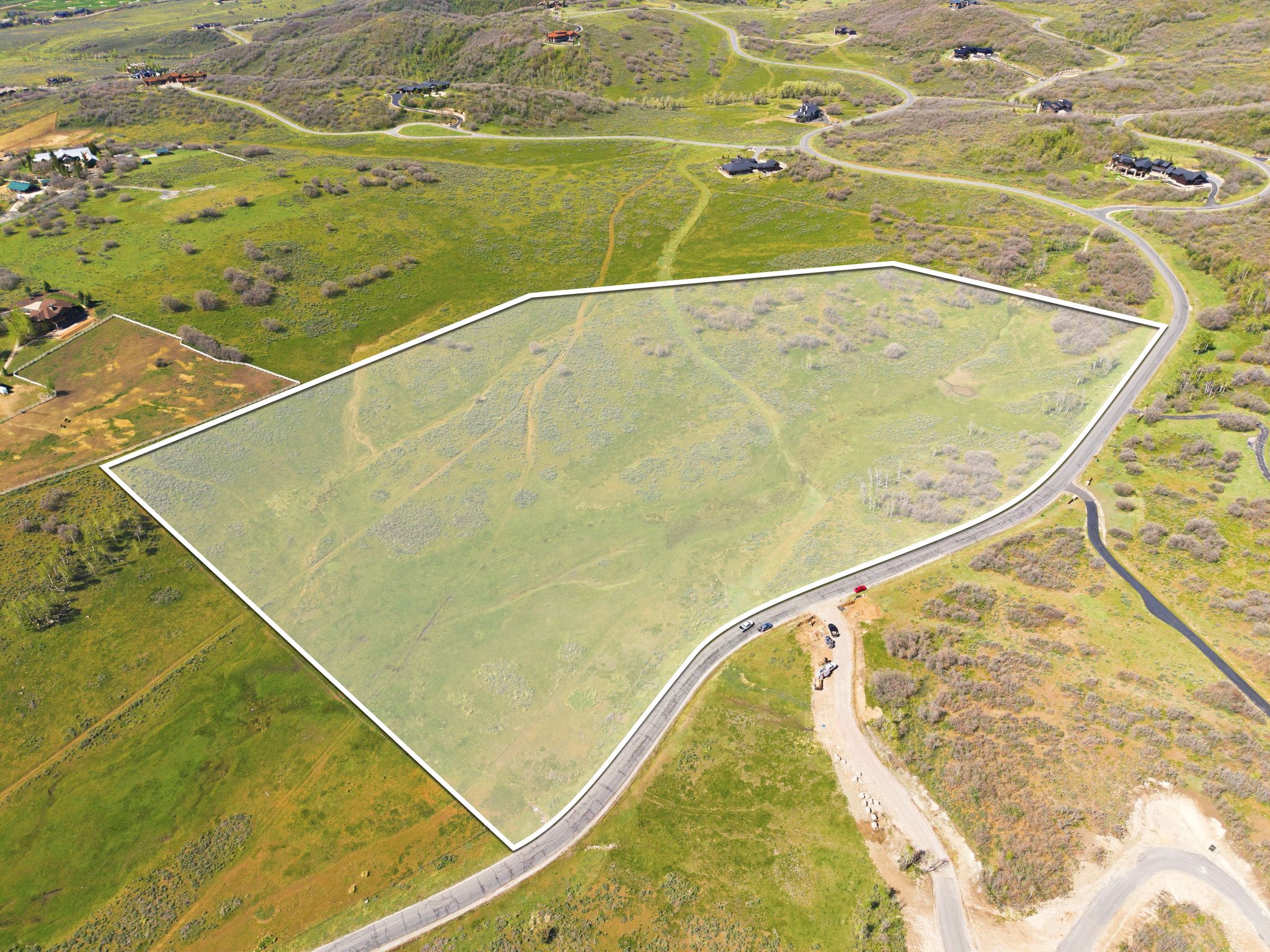 Expansive undeveloped parcel featuring a perimeter boundary outline