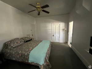 Bedroom featuring carpet floors, ceiling fan, and a closet