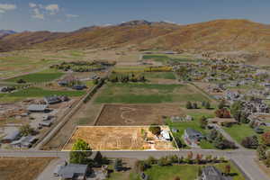 View of rural area with mountains and nearby suburban area