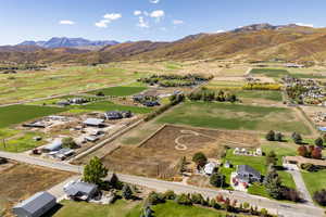 Overview of rural landscape with mountains and farmland