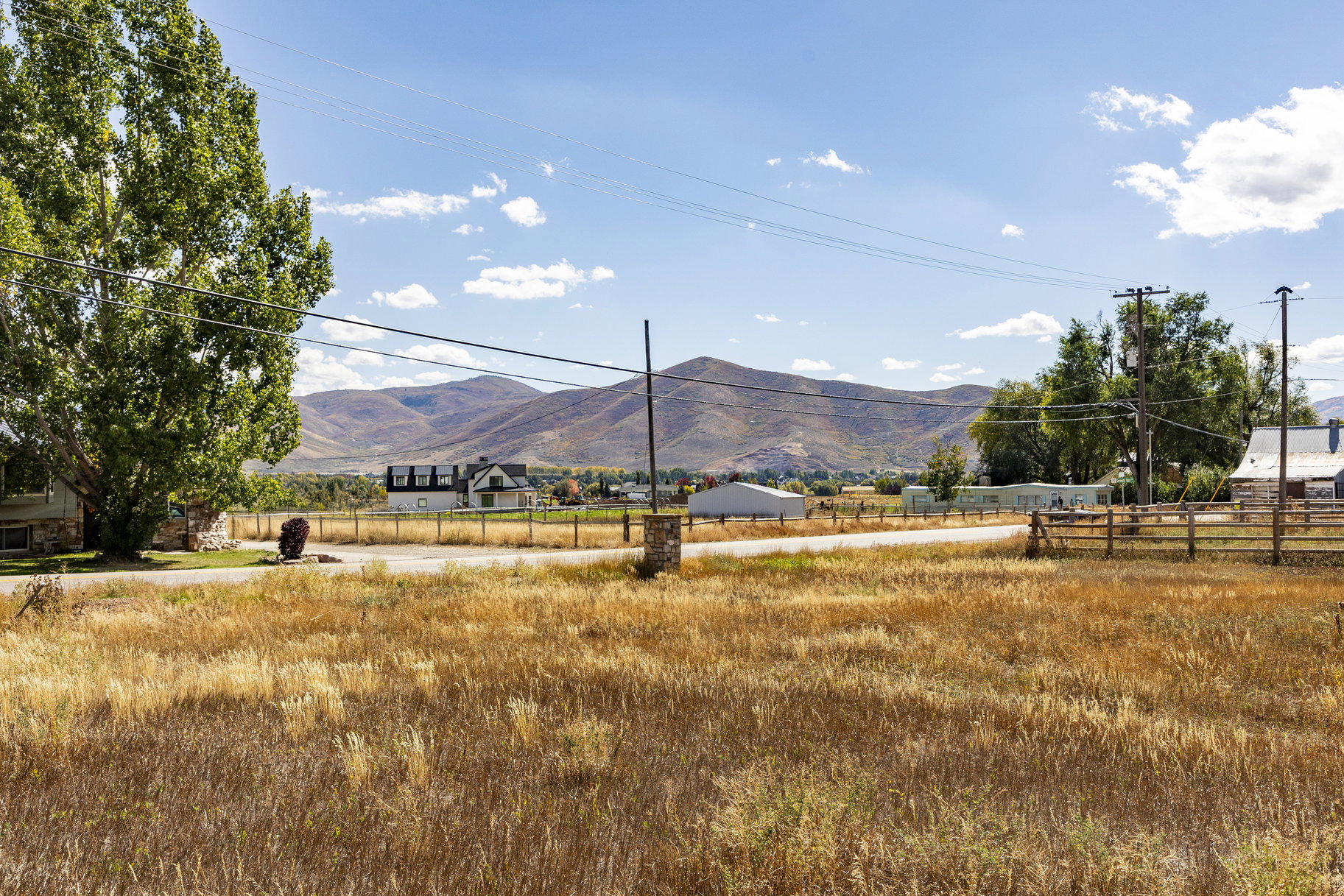 View of mountain background featuring rural landscape
