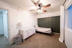 Bedroom featuring carpet flooring and ceiling fan