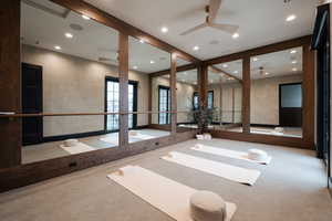 Exercise area featuring recessed lighting