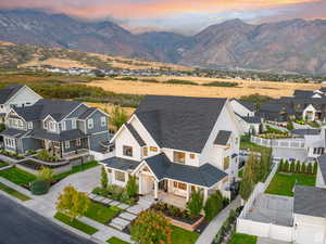 Aerial view at dusk of a residential view and a mountain view