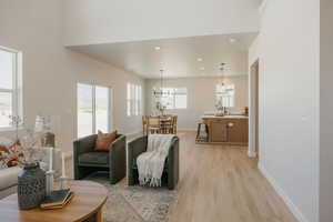 Living room featuring recessed lighting and light wood-type flooring