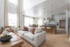 Living area with light wood-type flooring