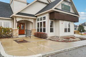 View of home's exterior with roof with shingles