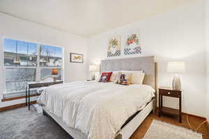 Carpeted bedroom with baseboards