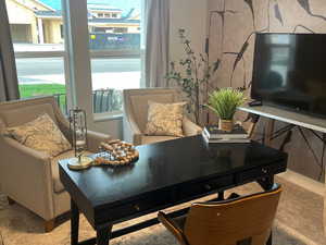 Guest bedroom being used as an office in this photo