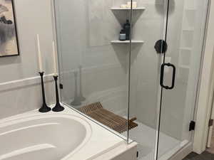 Master bath with separate tub and shower