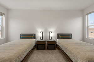 View of carpeted bedroom