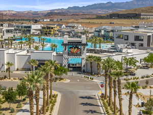 Bird's eye view of a mountain backdrop and a pool