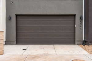 Garage featuring driveway