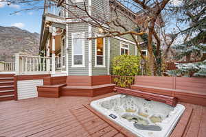 Wooden terrace featuring a mountain view