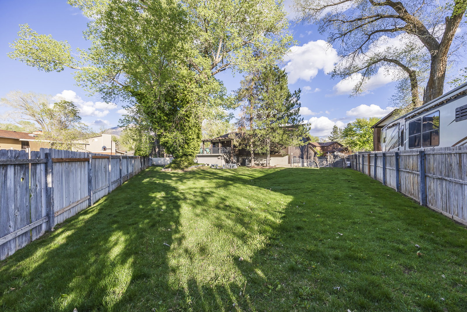 View of fenced backyard