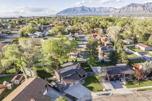 Aerial view of residential area with a mountain backdrop