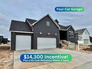 Modern farmhouse style home with board and batten siding, roof with shingles, and concrete driveway