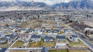 View of property location with a mountainous background and nearby suburban area