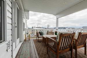 Balcony with a residential view and outdoor lounge area