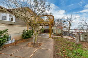 View of property's community featuring a fenced backyard