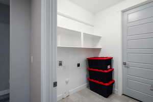 Laundry room with hookup for a washing machine and gas dryer hookup