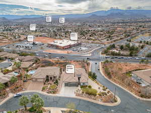 Aerial view of residential area with a mountainous background