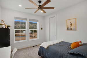 upstairs 2nd bedroom featuring ceiling fan and recessed lighting