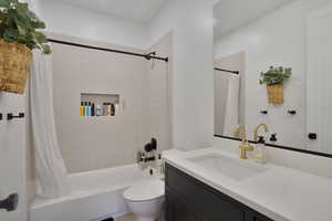upstairs Full bathroom with shower / bathtub combination